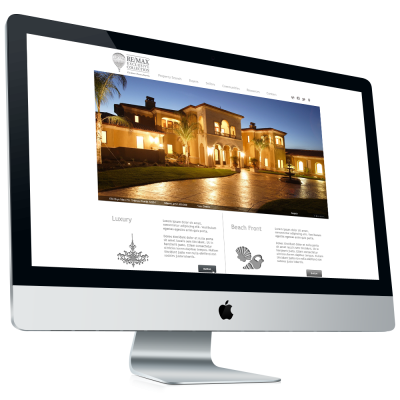 Real estate website design example for RE/MAX Exclusive Collection displayed on desktop monitor